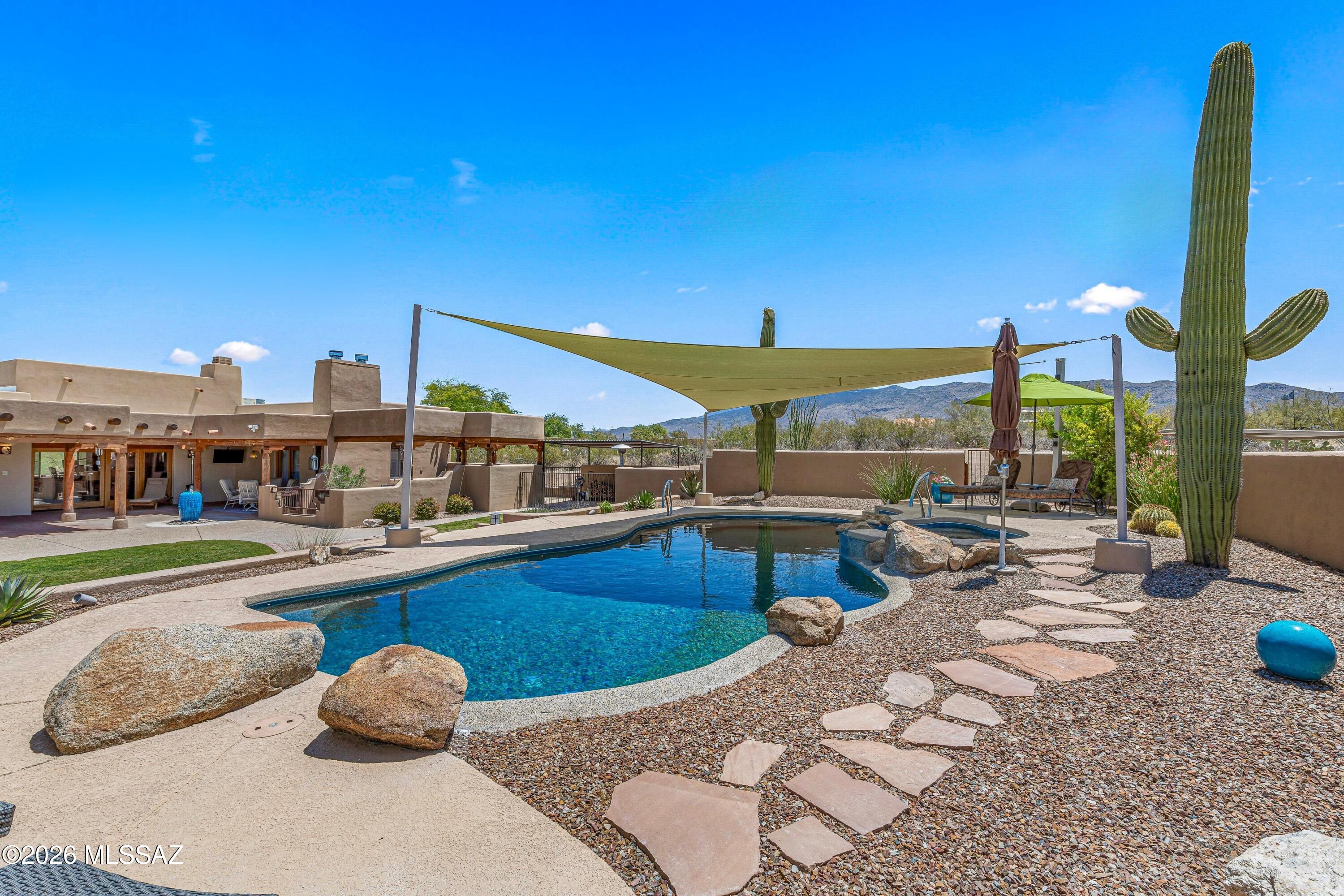 11160 East Golf Links Road Tucson, AZ 85730 - Photo 34 of 51 Huge saguaros add desert charm.