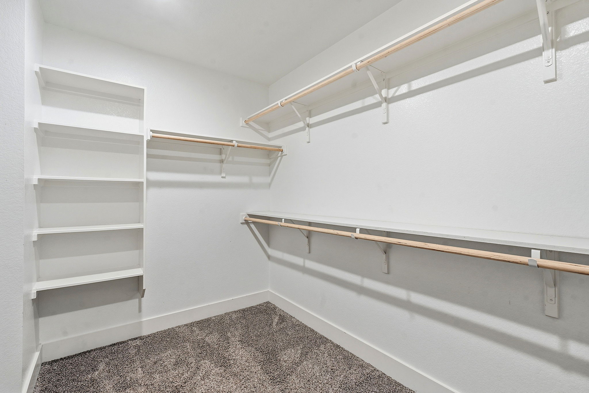 7105 Silver Star Lane, Unit 59 Austin, TX 78744 - Photo 10 of 19 a view of an empty walk in closet