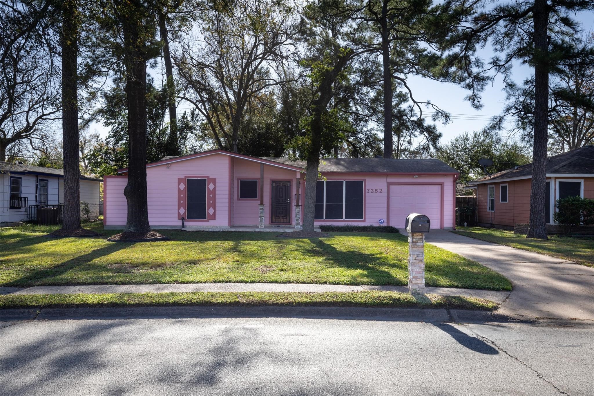 7252 Parker Road Houston, TX 77016 - Photo 1 of 8 a view of a house with a yard covered in front of it