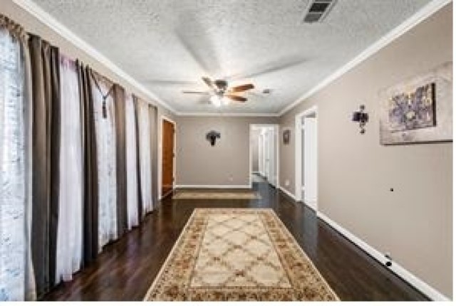 7252 Parker Road Houston, TX 77016 - Photo 2 of 8 a view of entryway with wooden floor