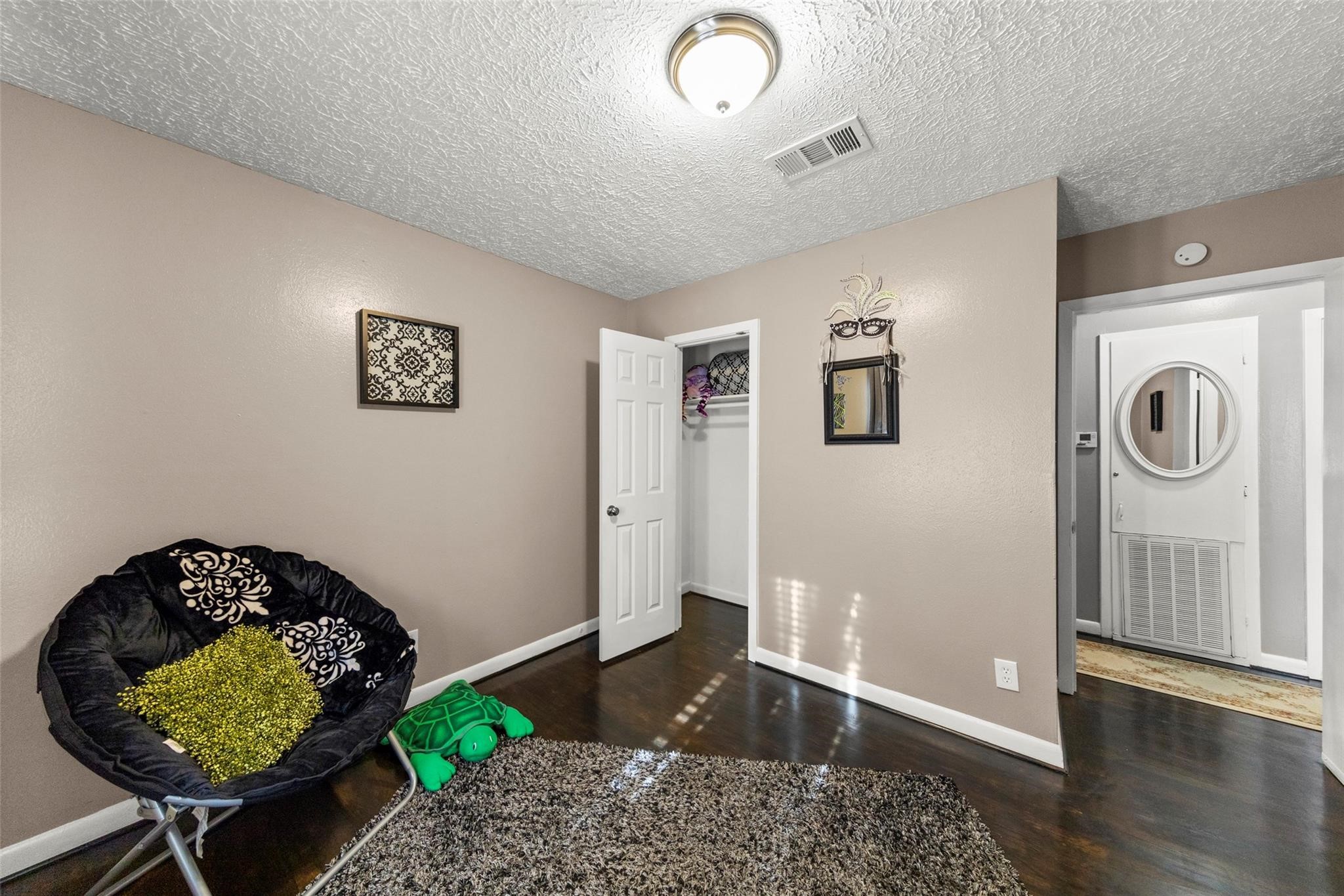 7252 Parker Road Houston, TX 77016 - Photo 4 of 8 a view of entryway with wooden floor