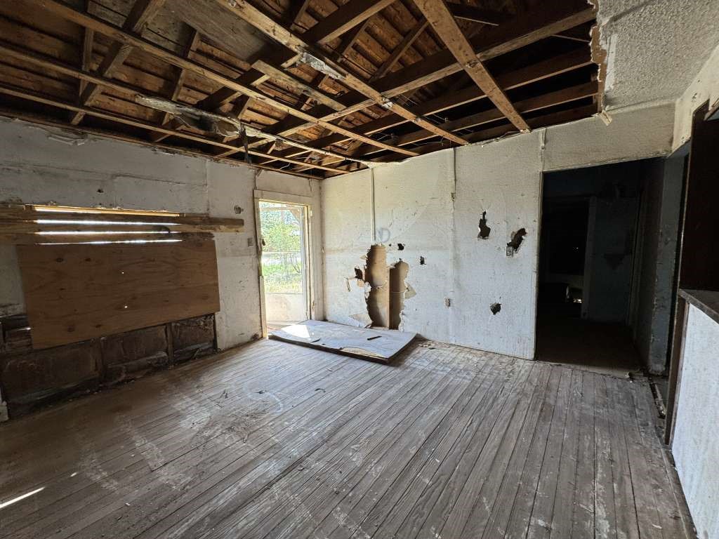 1001 East 14th Street Littlefield, TX 79339 - Photo 6 of 9 a view of a room with wooden floor