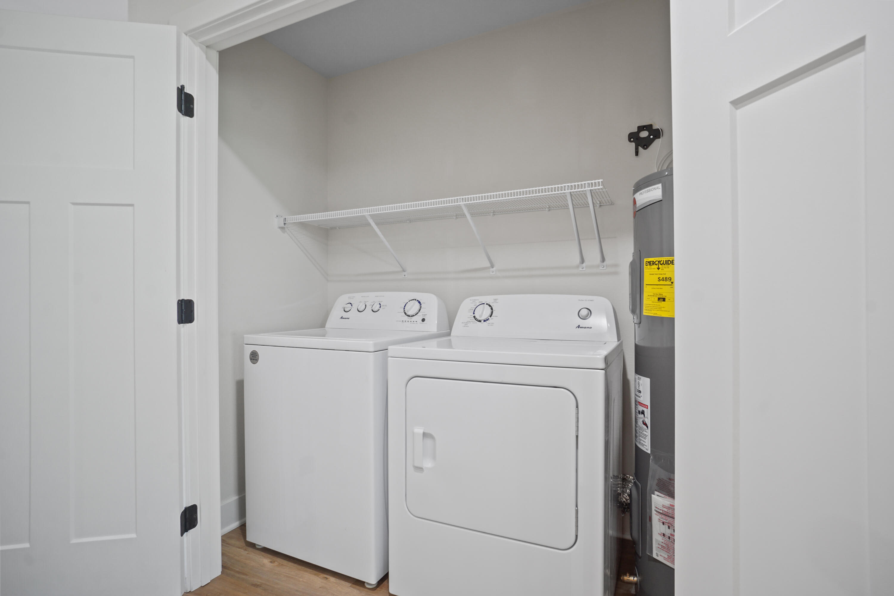 117 Eiche Drive, Unit 2 Slinger, WI 53086 - Photo 21 of 24 Laundry Closet