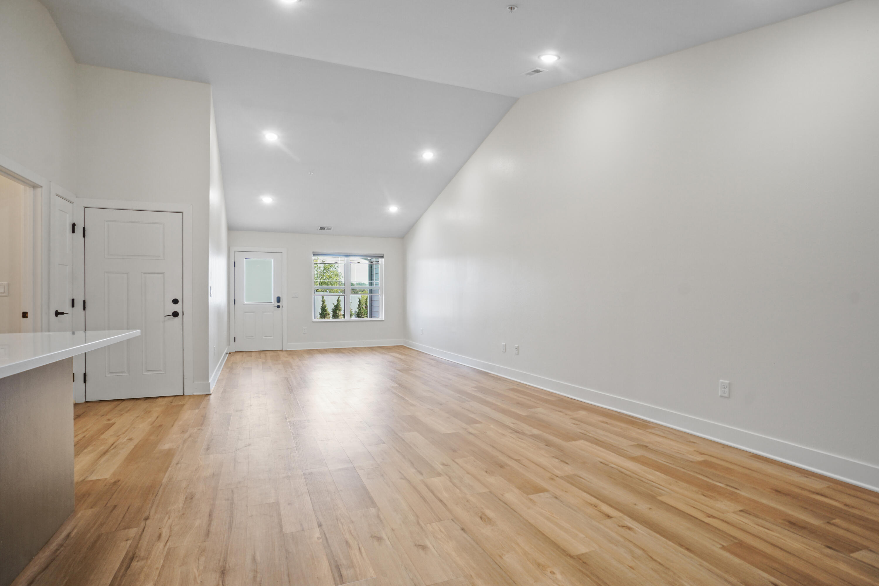 117 Eiche Drive, Unit 2 Slinger, WI 53086 - Photo 5 of 24 Great Room