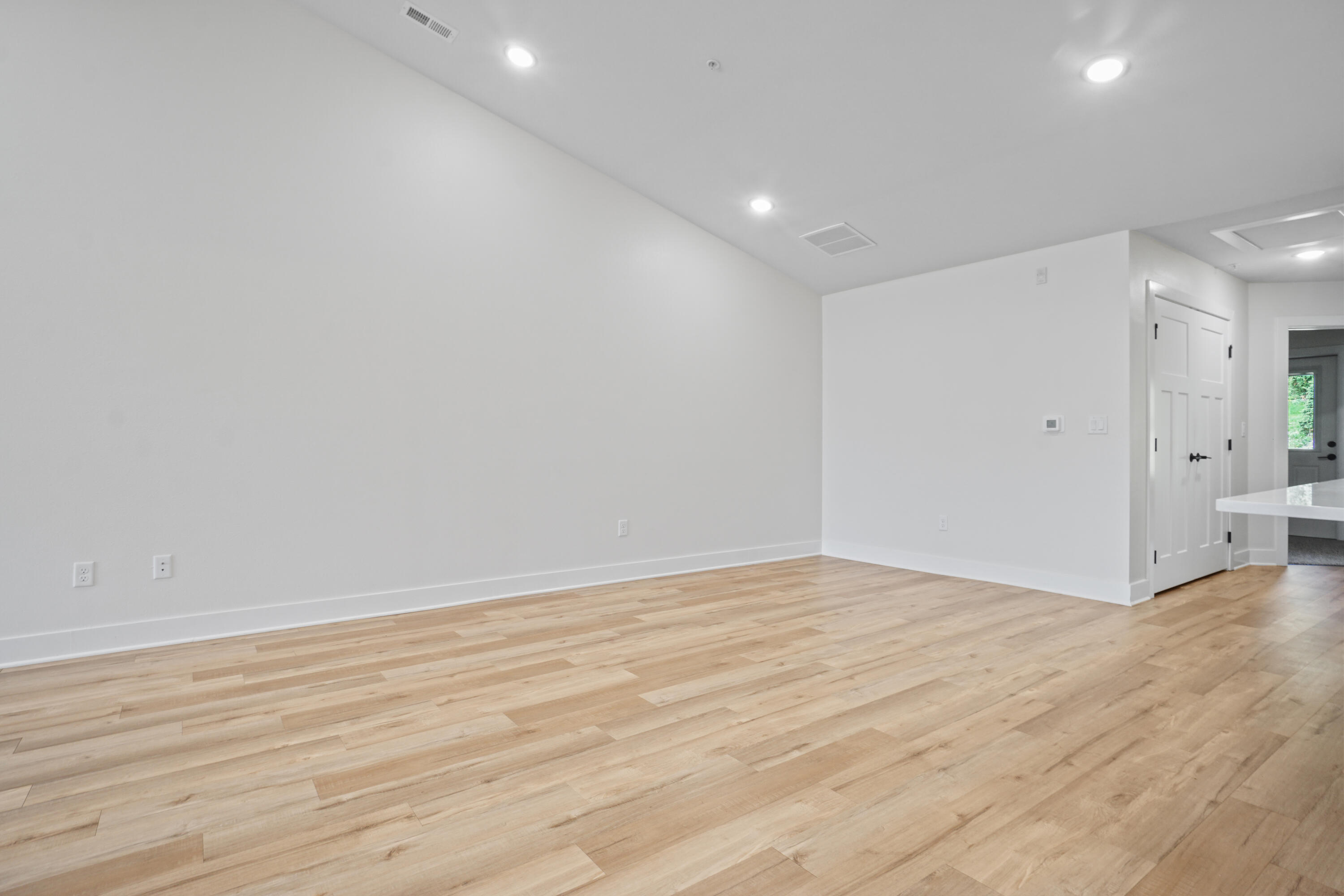 117 Eiche Drive, Unit 2 Slinger, WI 53086 - Photo 8 of 24 Great Room