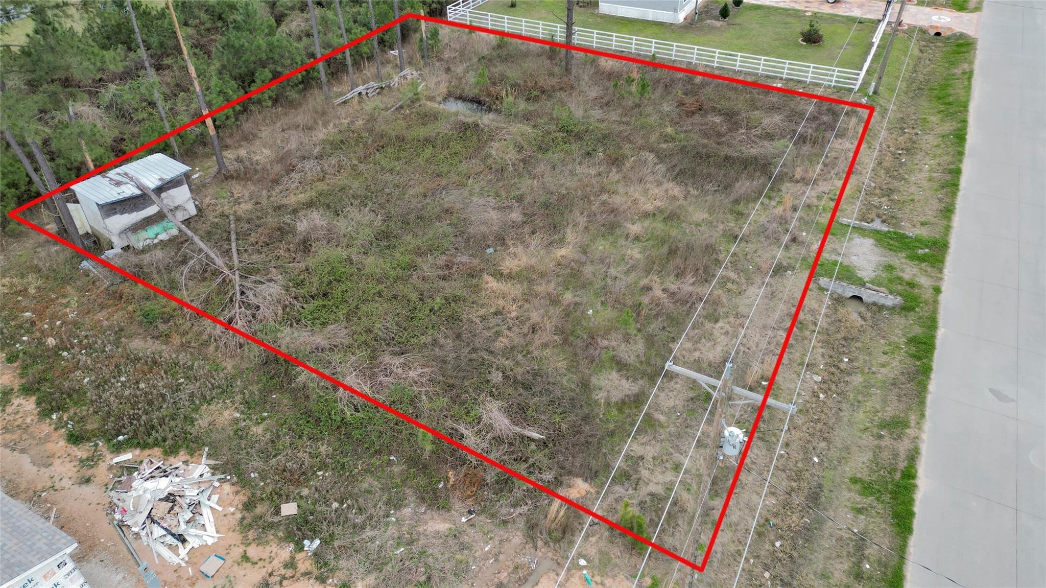 296 County Road 377 Cleveland, TX 77327 - Photo 9 of 10 a bird view of a forest