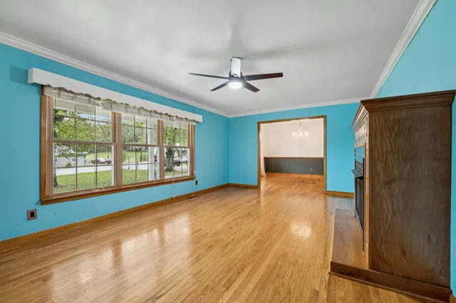 a kitchen with kitchen island granite countertop stainless steel appliances and stove top oven