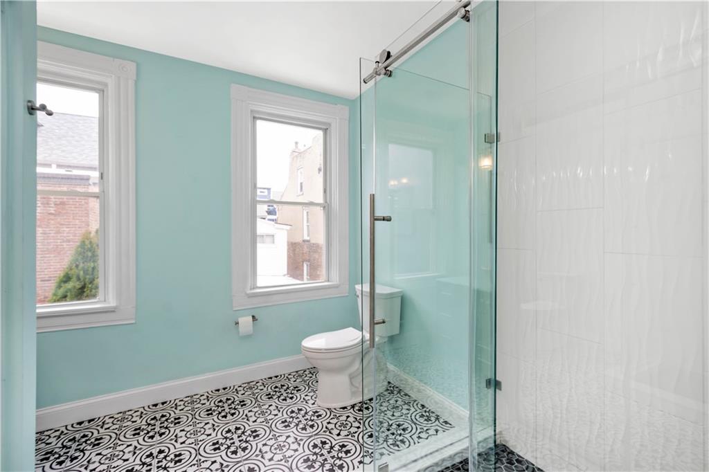 162 Locarna Way Pittsburgh, PA 15201 - Photo 11 of 25 a bathroom with a toilet sink and window