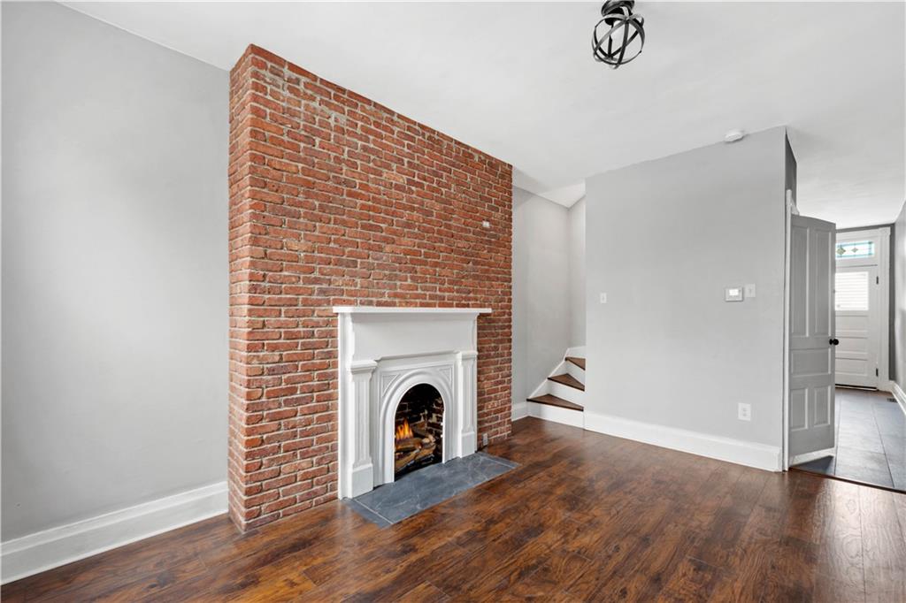 162 Locarna Way Pittsburgh, PA 15201 - Photo 15 of 25 a view of an empty room with a fireplace