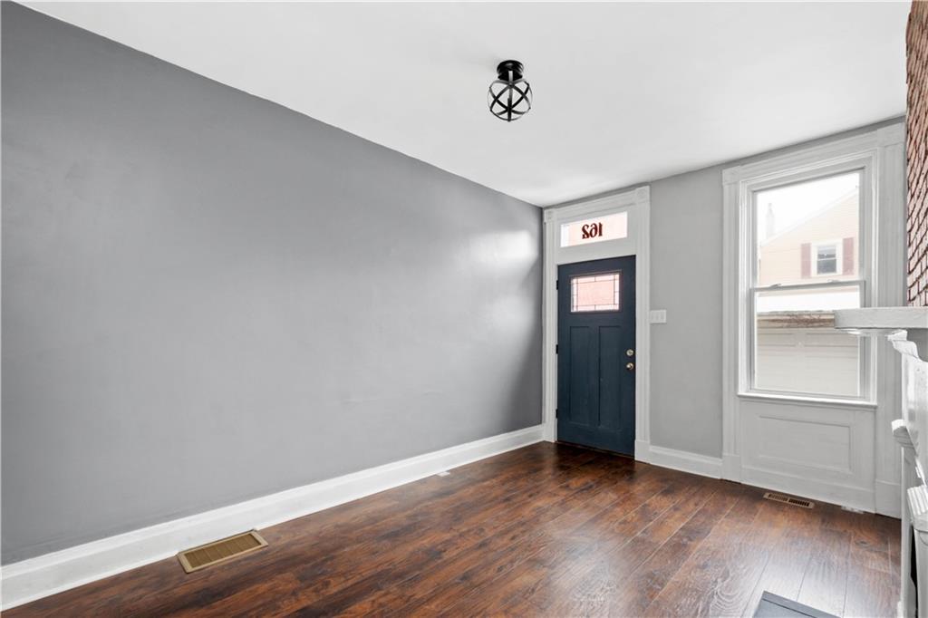 162 Locarna Way Pittsburgh, PA 15201 - Photo 16 of 25 a view of an empty room with wooden floor and closet
