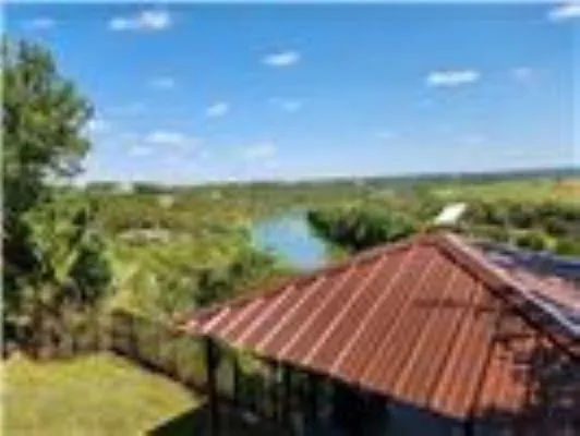 a view of a yard with an outdoor space