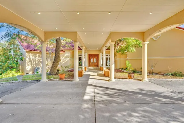 a living room with large windows