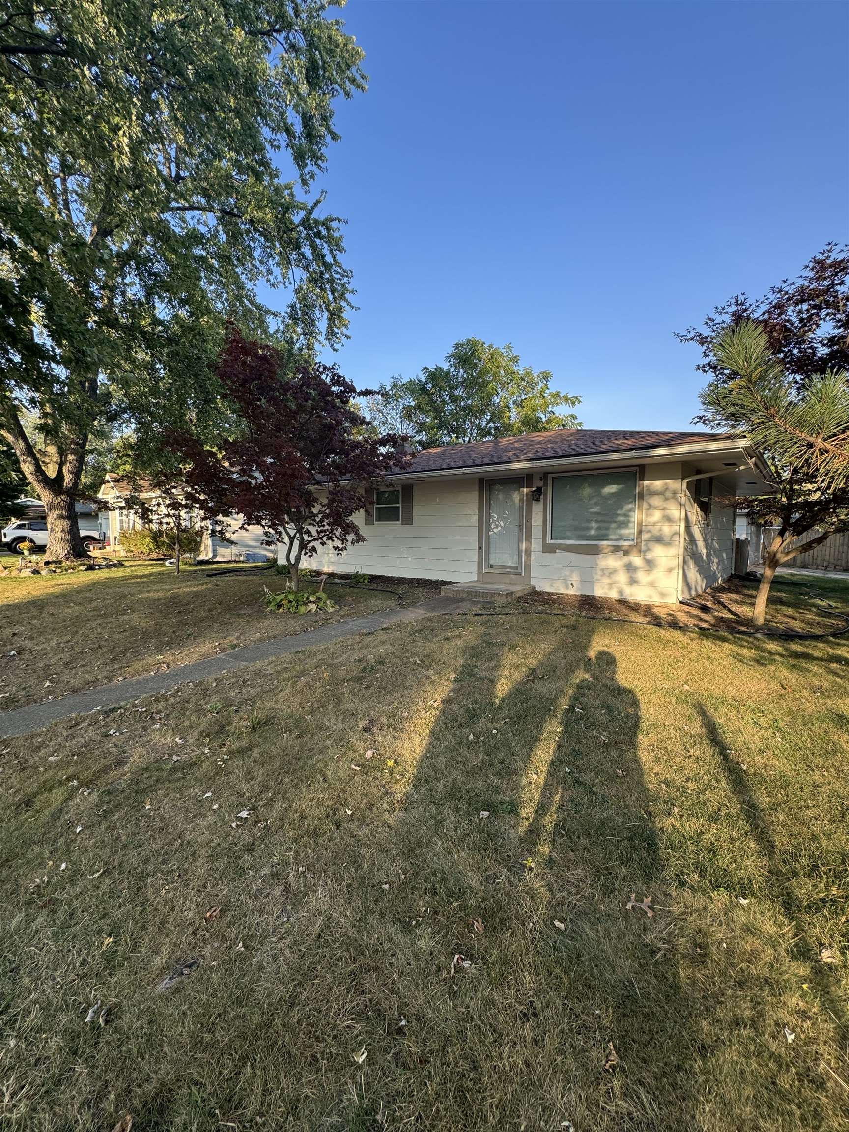 1120 Esmond Drive Rockford, IL 61108 - Photo 1 of 20 a view of a water fountain in front of a house