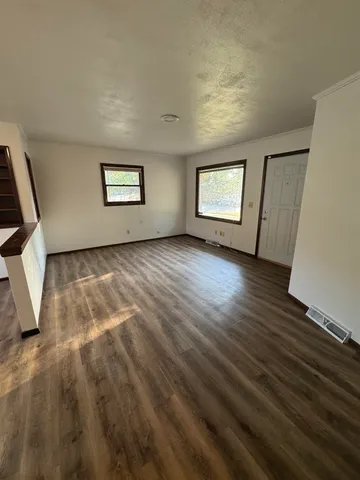 a view of a room with racks on the wall