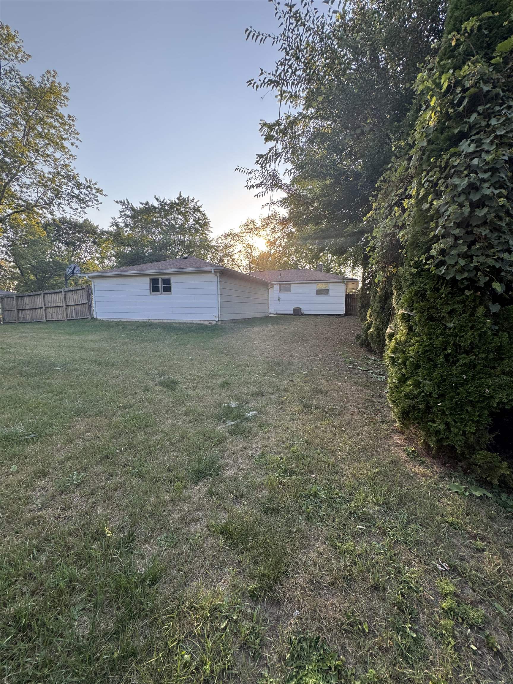 1120 Esmond Drive Rockford, IL 61108 - Photo 6 of 20 a view of a big yard with a house
