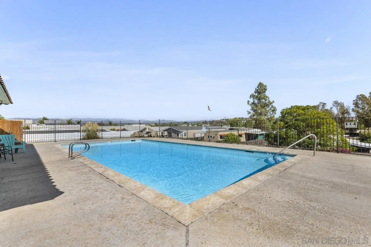 900 Howard Avenue, Unit 54 Escondido, CA 92029 - Photo 23 of 25 a view of a swimming pool and lake view