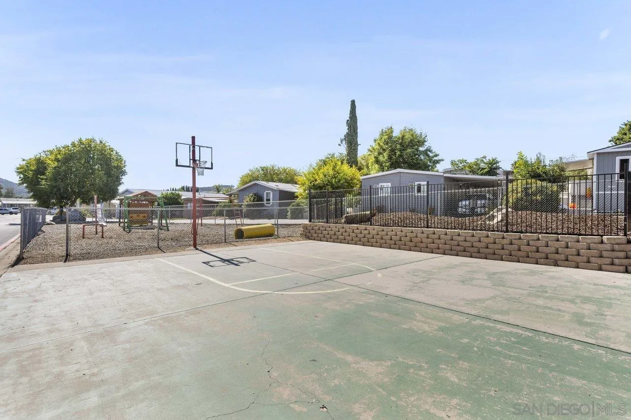 900 Howard Avenue, Unit 54 Escondido, CA 92029 - Photo 24 of 25 a view of a tennis court