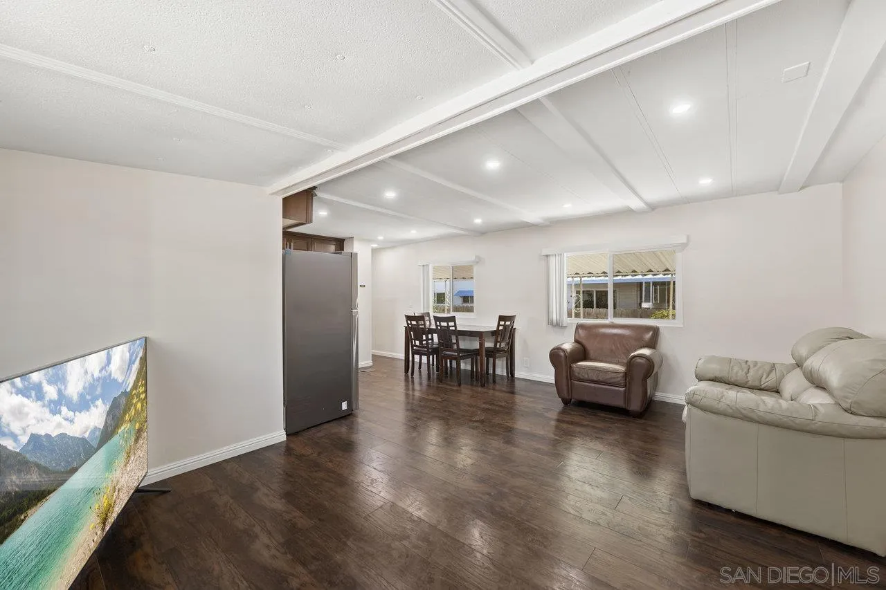 900 Howard Avenue, Unit 54 Escondido, CA 92029 - Photo 7 of 25 a living room with furniture and a table