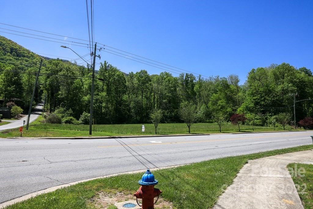 9999 A Soco Road Maggie Valley, NC 28751 - Photo 11 of 29 a view of a road with a big yard