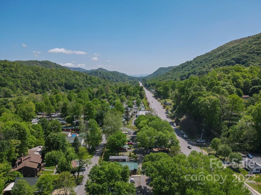 9999 A Soco Road Maggie Valley, NC 28751 - Photo 4 of 29 a view of a city with lush green forest