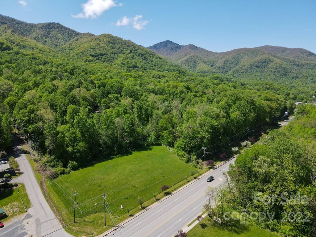 9999 A Soco Road Maggie Valley, NC 28751 - Photo 5 of 29 a view of a lush green field with a view of mountains in the background
