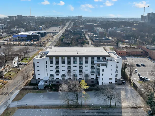 a view of a backyard of the house