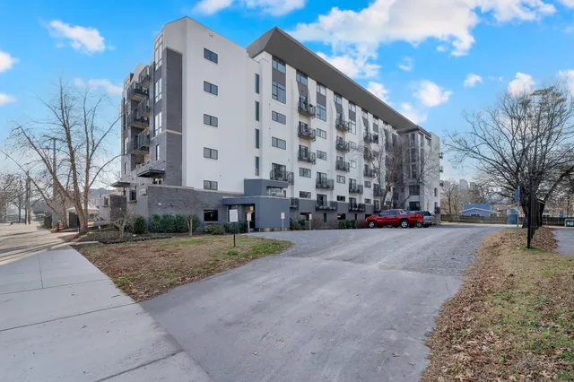 a city street with tall buildings