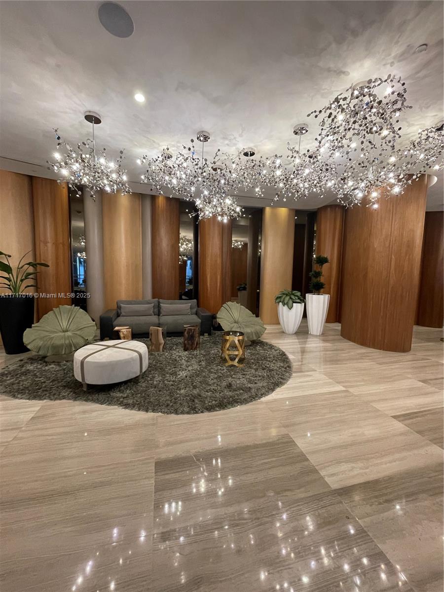 488 Northeast 18th Street, Unit 4009 Miami, FL 33132 - Photo 25 of 44 a view of a room with gym equipment