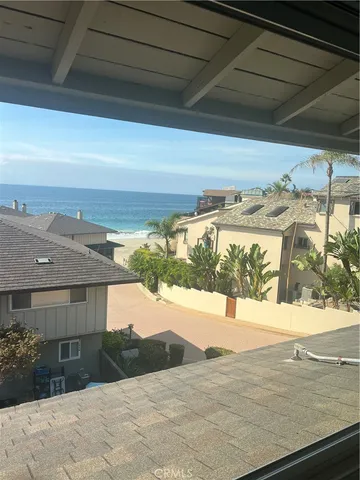 a view of a backyard of the house