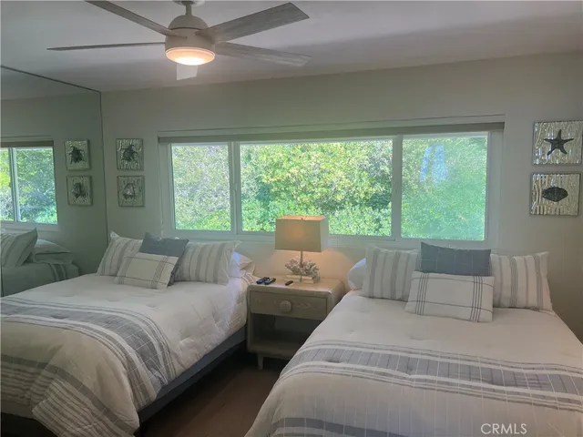 a view of a swimming pool with a lounge chairs