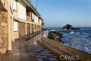 a bathroom with a shower toilet and sink