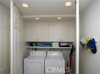 a view of a house with backyard sitting area and garden