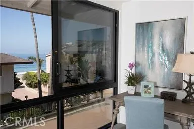 a room with a table and chairs