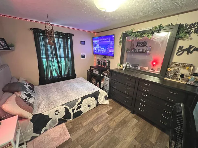 a room with furniture and gym equipment