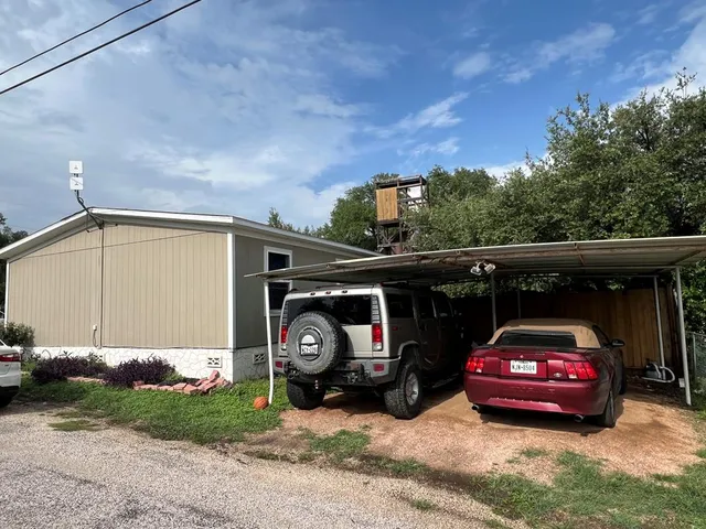 a car parked in front of a house