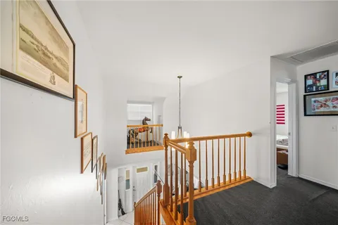 a view of hallway with stairs