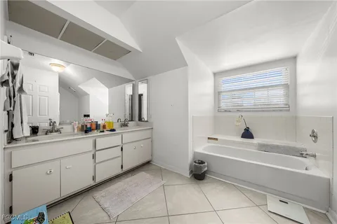 a bathroom with a bathtub sink and toilet