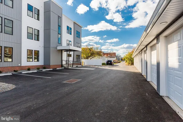 a view of a street with building