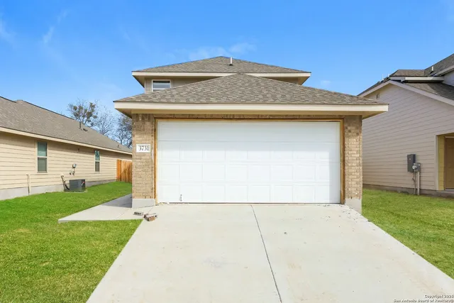 a front view of house with yard