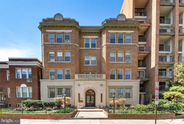 a front view of residential houses with street