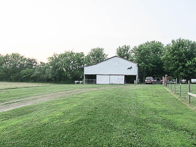269 South Commerce Road Watertown, TN 37184 - Photo 3 of 23 a house view with a garden space