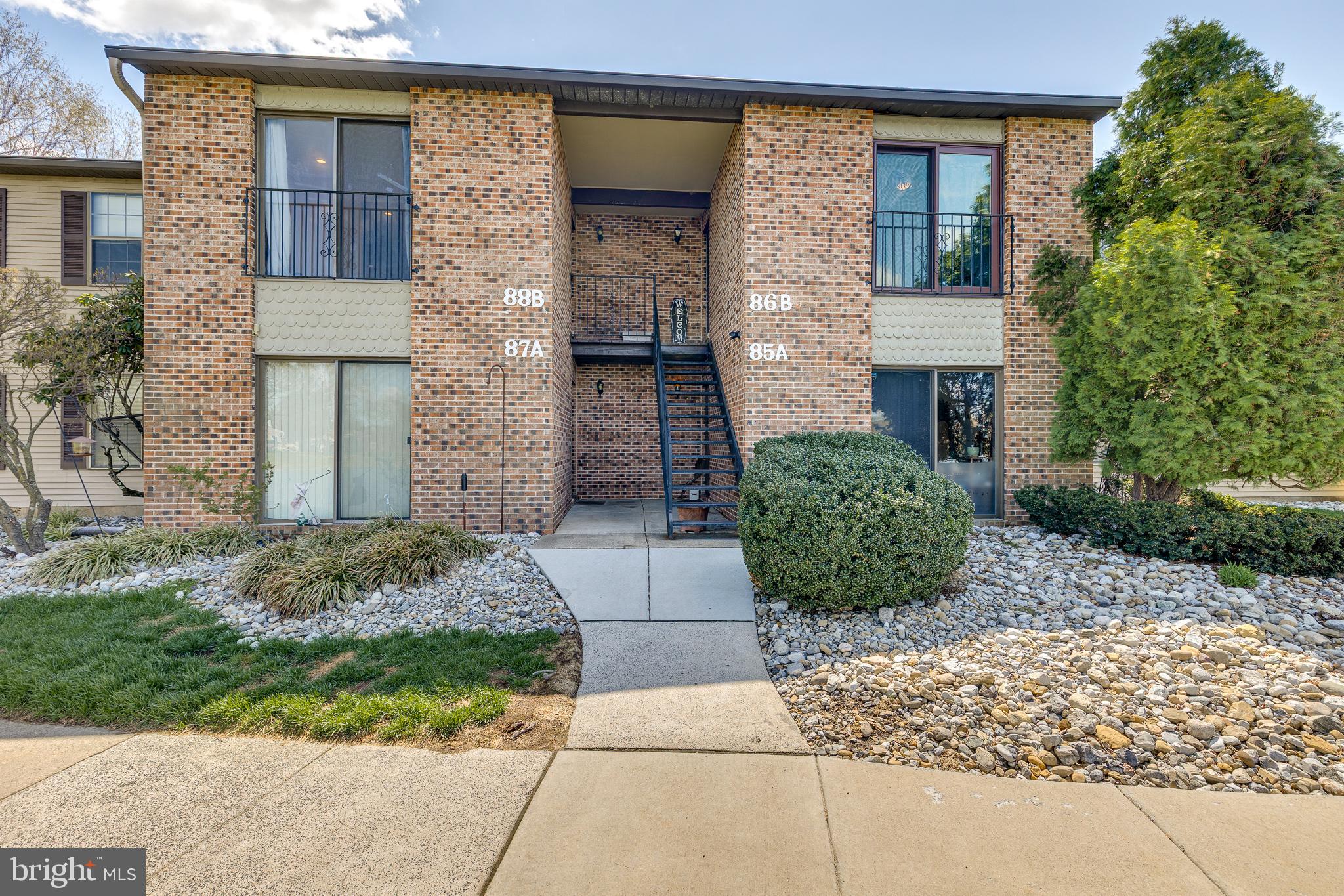 88 B Red Cedar Court Mount Laurel, NJ 08054 - Photo 1 of 19 a front view of a house
