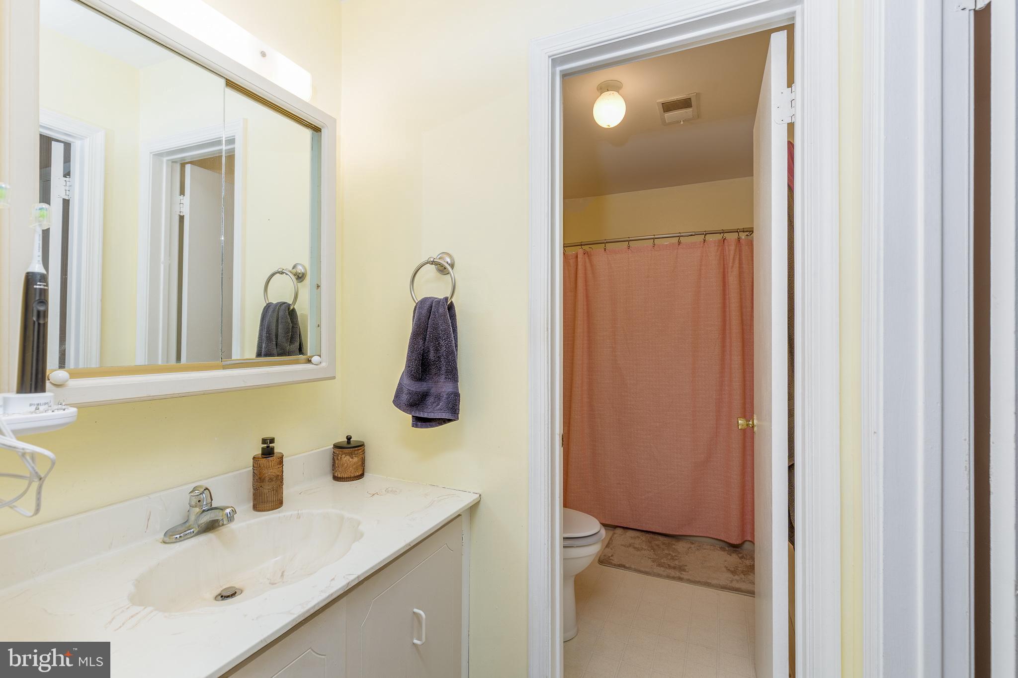 88 B Red Cedar Court Mount Laurel, NJ 08054 - Photo 14 of 19 a bathroom with a sink and a mirror
