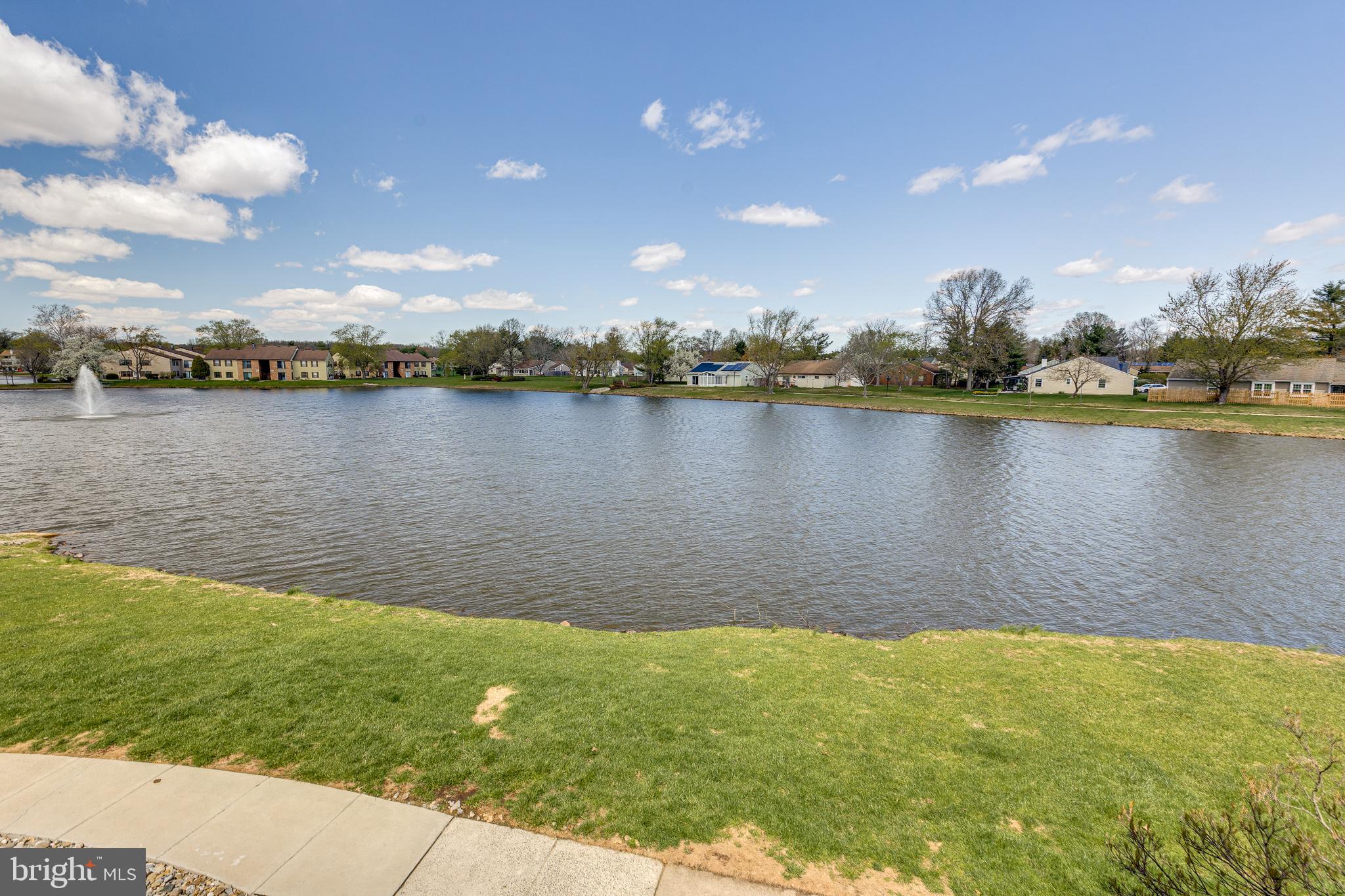 88 B Red Cedar Court Mount Laurel, NJ 08054 - Photo 3 of 19 a view of a lake from a yard