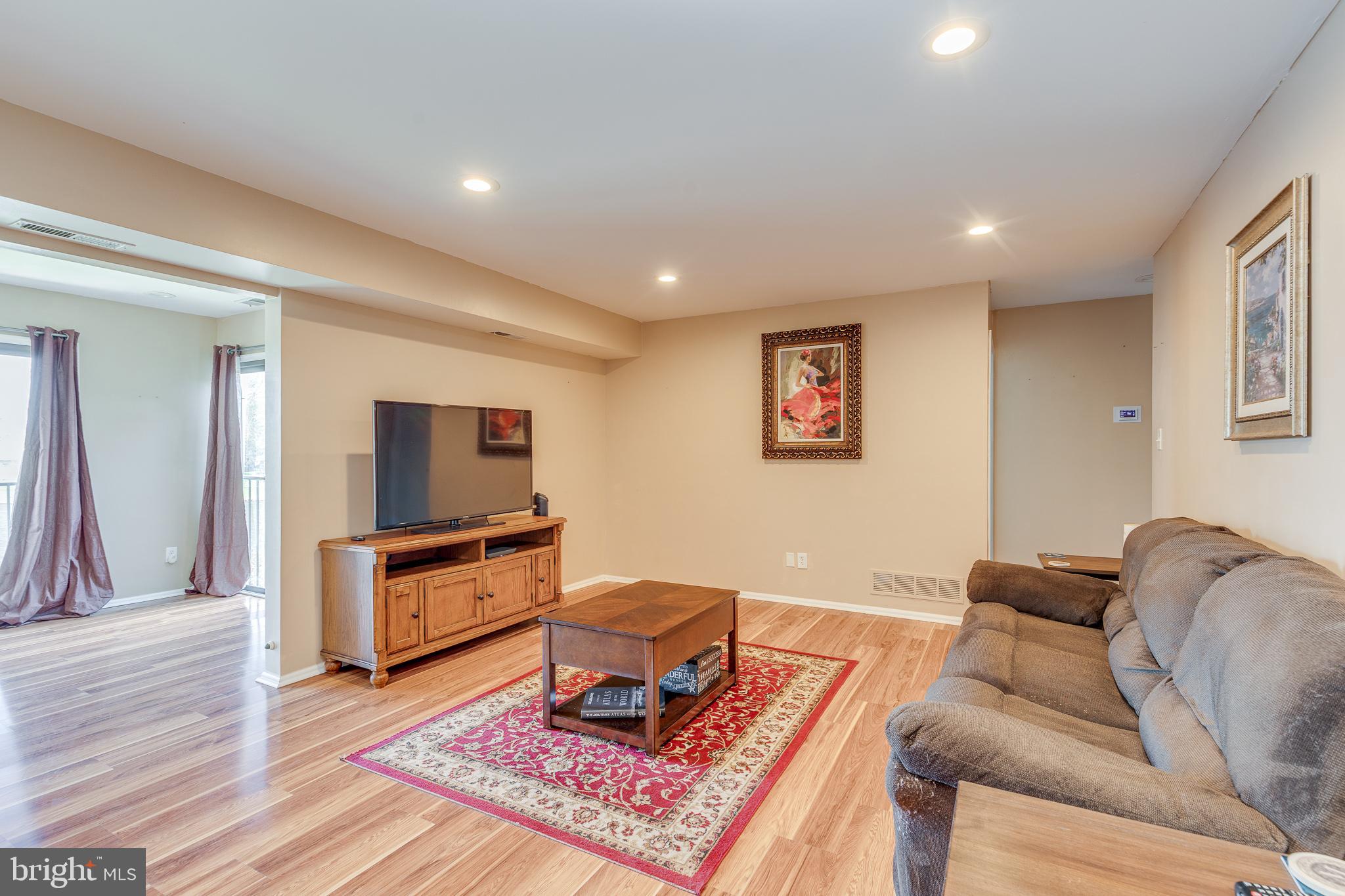 88 B Red Cedar Court Mount Laurel, NJ 08054 - Photo 4 of 19 a living room with furniture and a flat screen tv