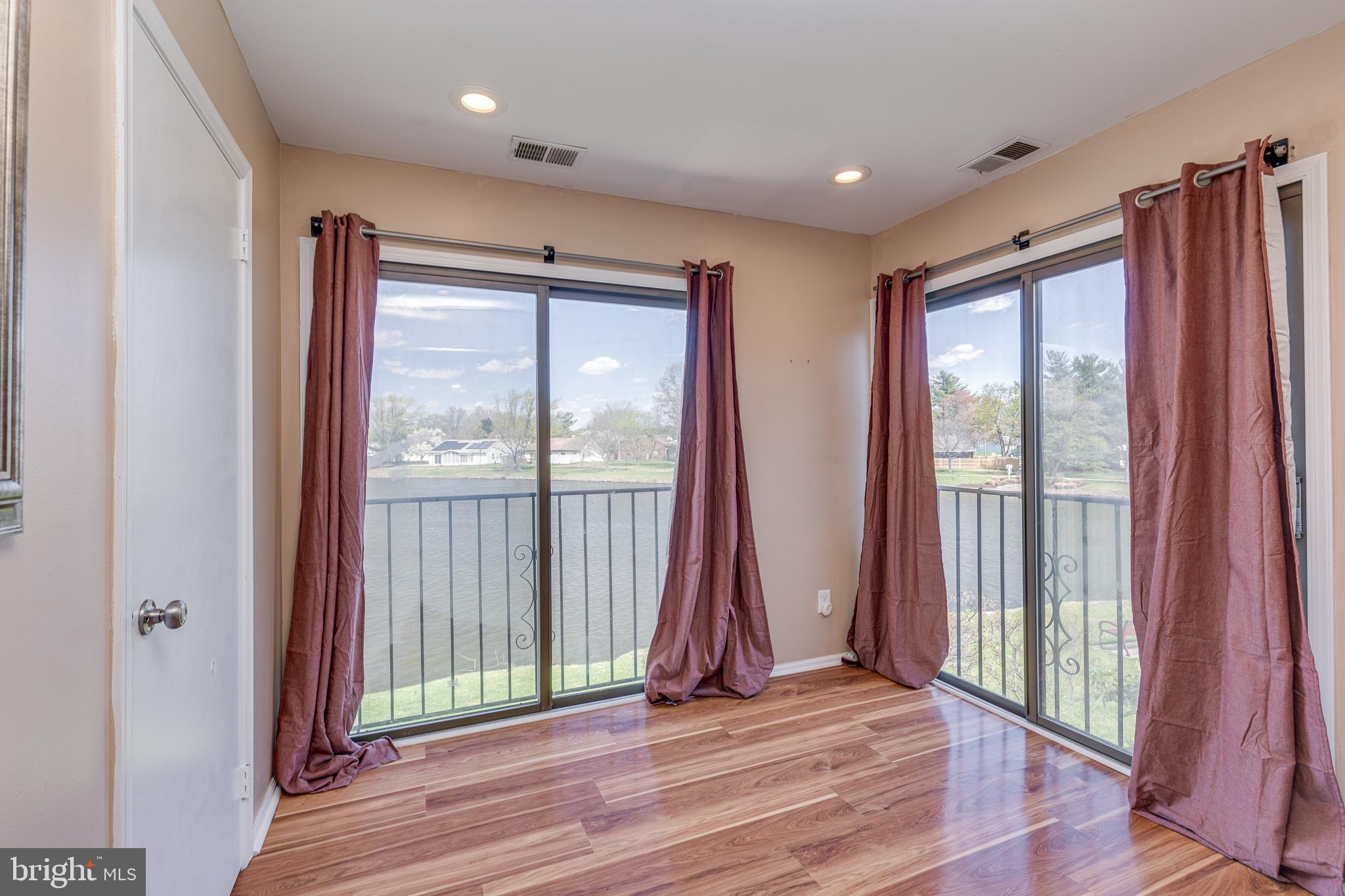 88 B Red Cedar Court Mount Laurel, NJ 08054 - Photo 6 of 19 a view of a room with wooden floor and door