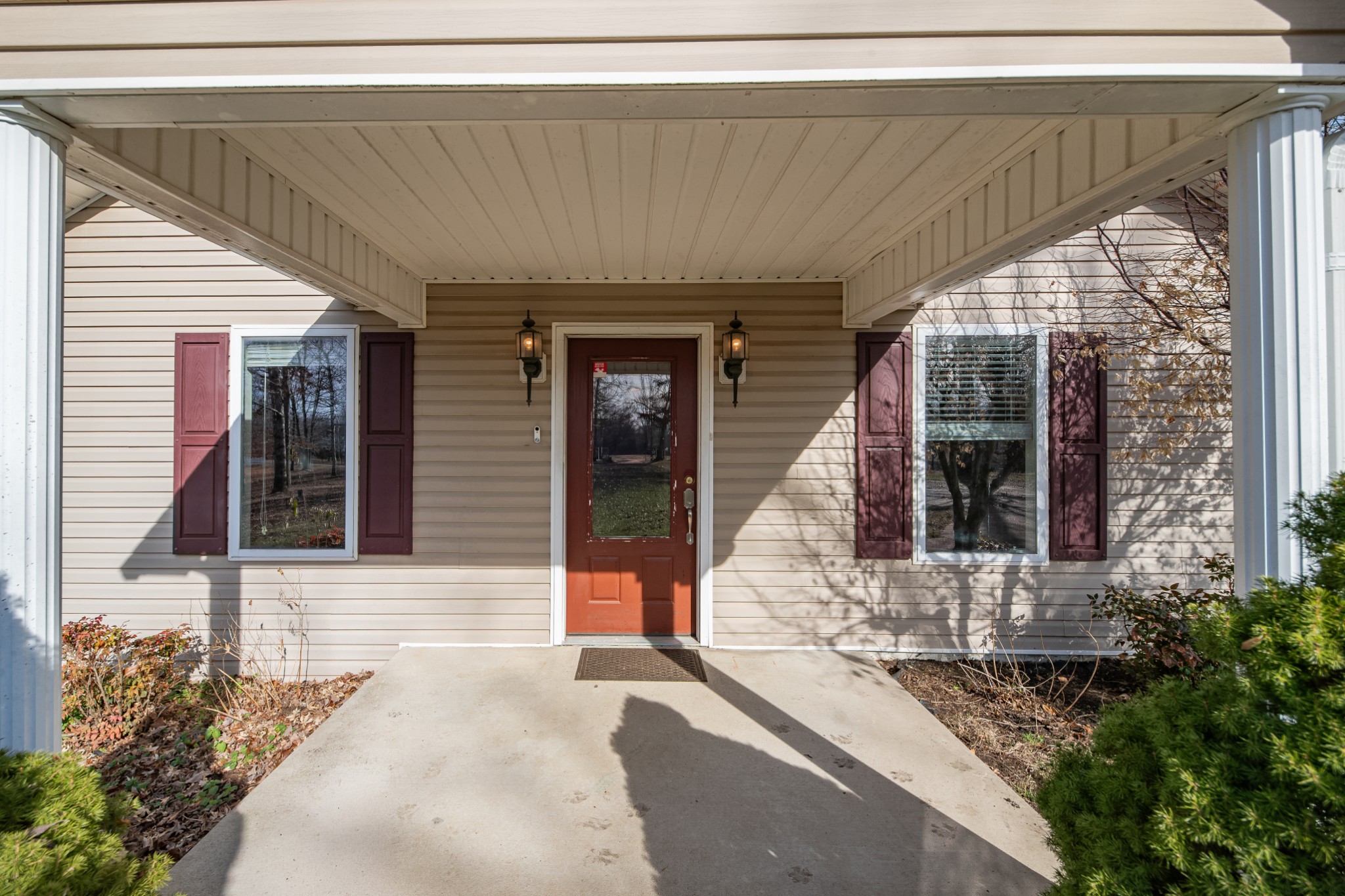 104 Zimmerman Road Hampshire, TN 38461 - Photo 3 of 73 a front view of a house with a porch
