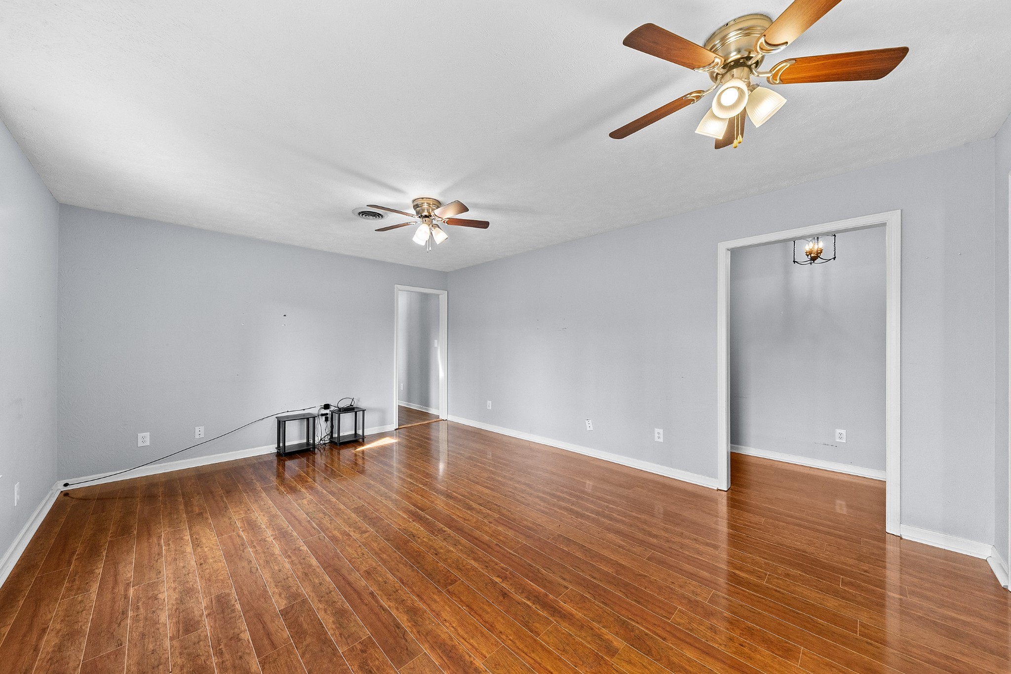 104 Zimmerman Road Hampshire, TN 38461 - Photo 6 of 73 a view of an empty room with wooden floor