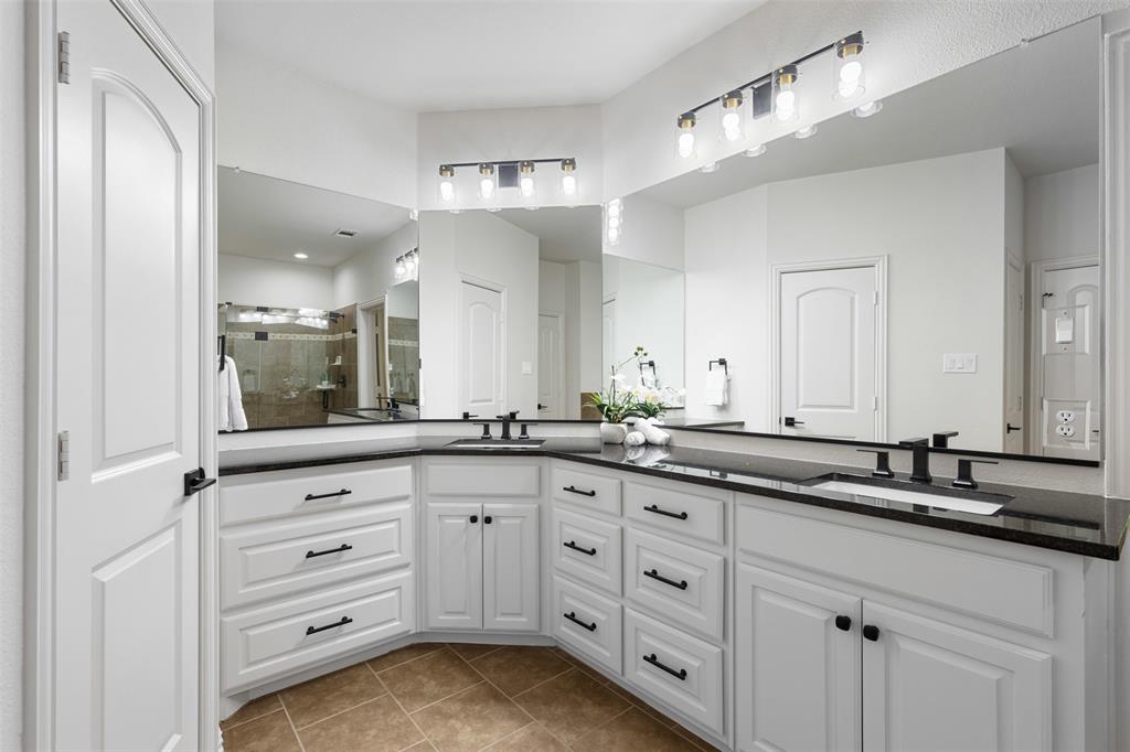 11984 Del Rio Drive Frisco, TX 75035 - Photo 13 of 38 a bathroom with a granite countertop sink double and mirror