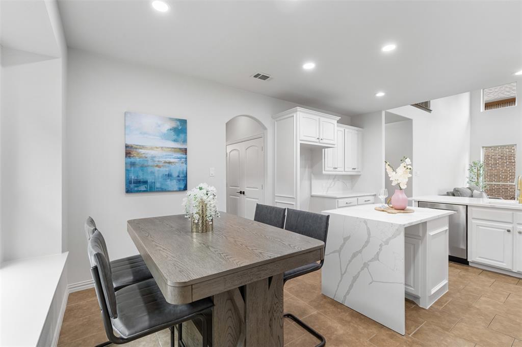 11984 Del Rio Drive Frisco, TX 75035 - Photo 18 of 38 a view of a dining room with furniture and window